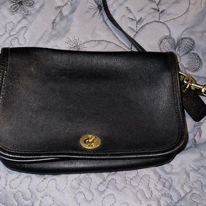 A crossbody coach purse